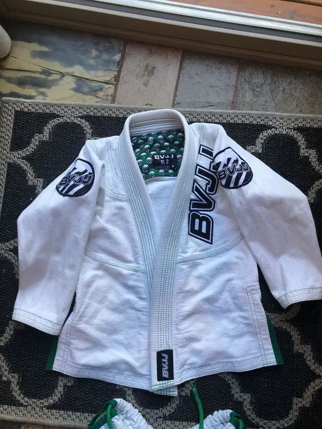 2 Kids jujitsu suits 6-9 and 10-13. Near new condition. in Kids & Youth in Calgary - Image 2