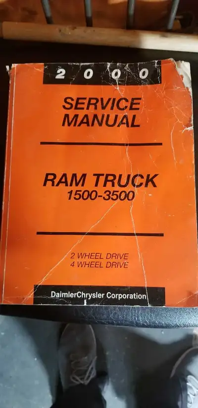 This is a service manual for a 2000 Dodge Ram 1500-3500 truck. It is in used condition, but still co...