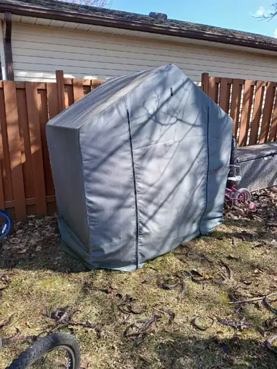 I'm selling a ShelterLogic Garden Shed Storage Tent that's perfect for protecting your outdoor equip...