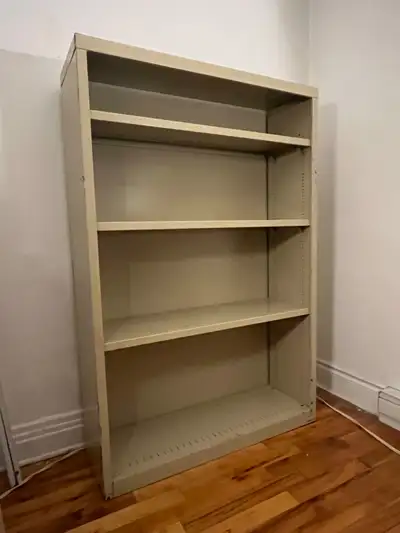 Vintage enamel-coated steel shelving unit in a warm beige/cream. Very sturdy and great for books, st...