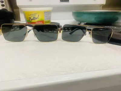 two identical pair of Versace sunglasses , View more