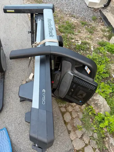 Free nordictrack C1750 treadmill and auto stride elliptical machine. Both work but treadmill screen...