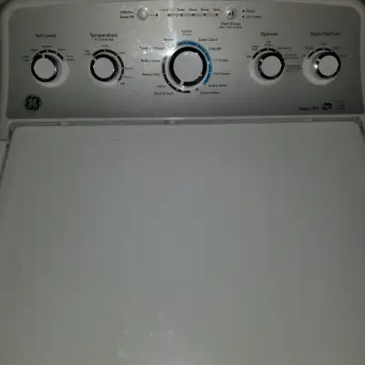 GE washer for parts or repair noisey bearing i believe.