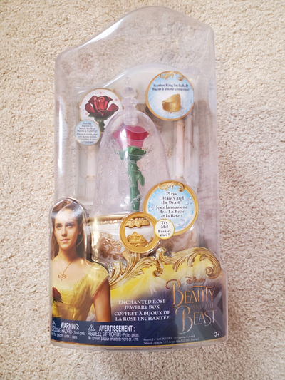 Brand new in box also included with beauty and the beast necklace Pick-up in Milton Call or text 416...
