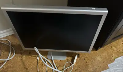 Works, some marks and a few dead pixels. Includes power supply Dvi to thunderbolt adapter included