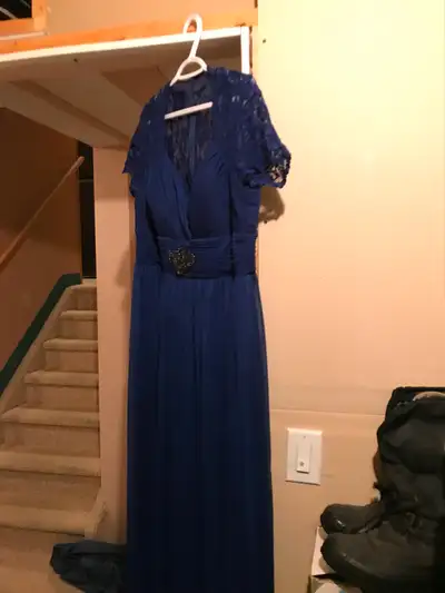 Royal blue long formal dress with beaded waist area and lace on back