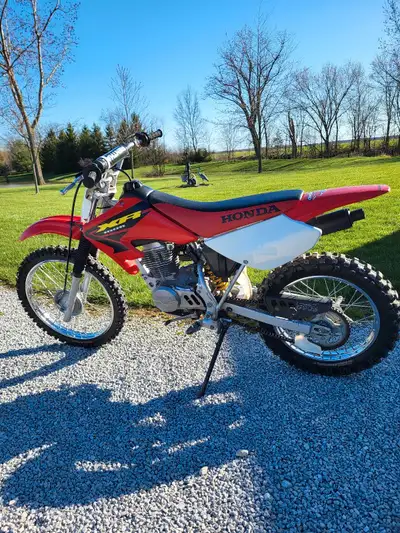 2004 xr100 in great shape, runs like new. Brand new tires. My son out grew it . $2500 call or text f...