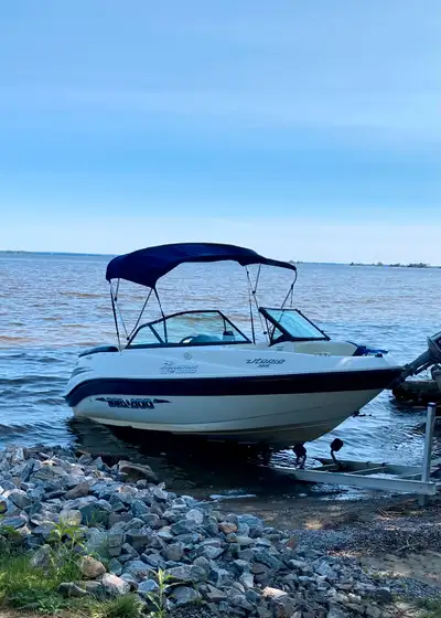 2003 SeaDoo Utopia, perfect for family fun and watersports! This boat has a powerful 200 HP Mercury...