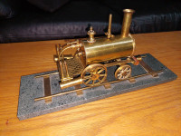Live steam engine dribbler train.
