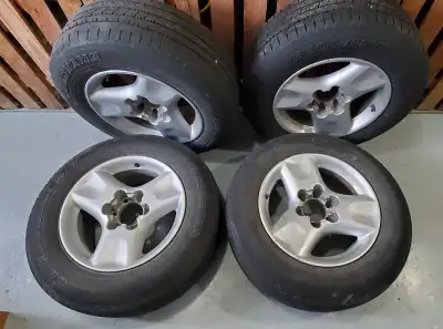 4 wheels - rims & tires Yokohama Geolander H/T 245/65R17 $300 for set tires, wheel, tire, spare, rim...