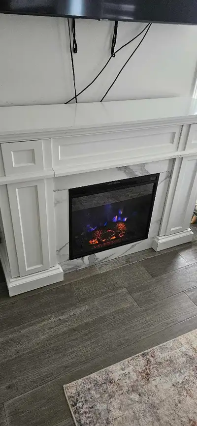 Electric fireplace and mantel with built in drawers, View more