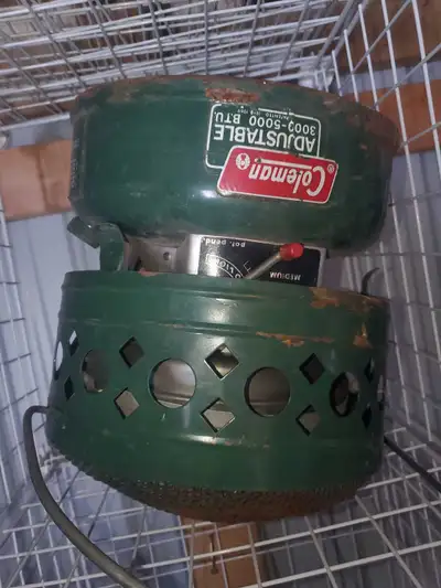 This is a used Coleman adjustable heater, offering between 3000-5000 BTU, ideal for small spaces nee...
