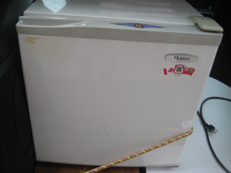 FS a mini bar fridge by Haier, exercise weights, IKEA Markus