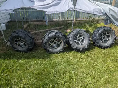 I have a gently used set of Mudzilla Maxxis AT28X12-12 ATV tires with rims and spacers. The tires al...