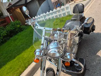 $ 2,750. Well kept. Garaged. Lots of chrome extras. New whitewall tires. New gold chain. Chrome rad...