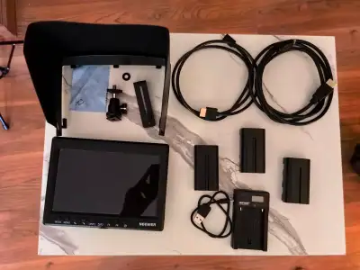 It is in good condition. $60. Including: F200 On-Camera Field HD Monitor, Sunshade, Mini Ball Head,...