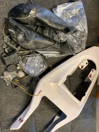Selling various parts from a used 2002 Suzuki GSXR 1000 motorcycle, as seen in the photos. These par...