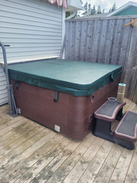 For sale a 6 person hot tub with new cover.  Excellent condition