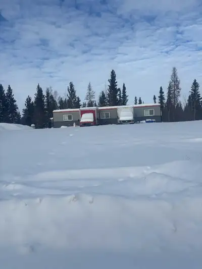 Lot 100x150 serviced lot water delivery and sewar tank fresh gravel built up has power 2012 well sit...