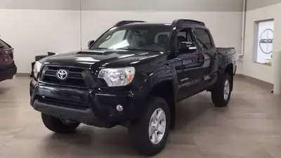 Looking for 2012-2015 Tacoma under 150,000km. Only looking for double cab long box (6ft) in black. T...