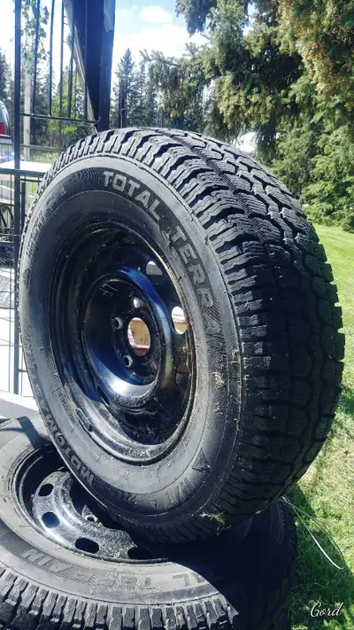 For sale is a set of 4. LT 245/75R-17 M&S tires mounted on 5-bolt steel rims, originally from a Dodg...