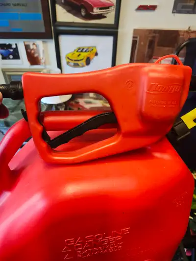 As new 25 litre tank with pump handle.