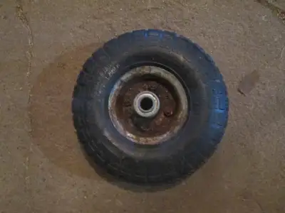 small wheelbarrow wheel. asking $1. if interested call or text me at 705 559 6493