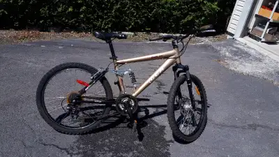 1 - Vélo CCM Torrent Al Dual XC 21 vitesse, 24'', Shimano, supension avant et arrière, frein avant à...