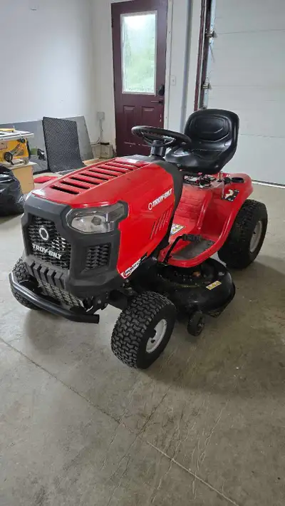 Troy-bilt 42" riding lawnmower with trailer, View more