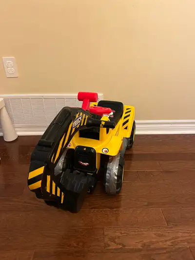 Has some button for sounds. Kid can sit on it. Steering wheel does turn the wheels. …some custom sti...