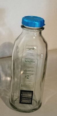 Clear Glass Milk Bottle, Pasteurized and Bottled By Hewitt s