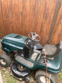 2 Garden Tractors and pile of equipment