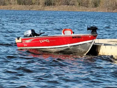 I'm selling my 14 ft lund wc with a new 25 hp yamaha 2025 4 stroke motor comes with power drive trol...