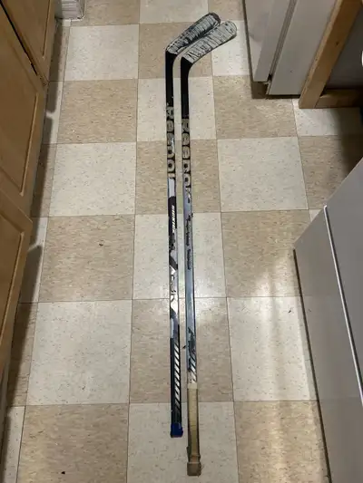 2 right handed used Reebok sickick 20 k senior sticks, paint peeling off , one’s tip is worn , other...