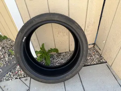 This is a single used Continental ExtremeContact 255/35ZR20 tire, perfect for replacing a damaged un...