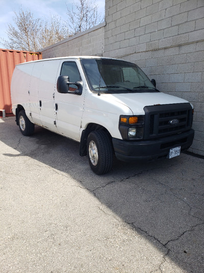2013 Ford E250 with divider and shelves