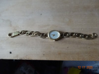 WATCH, lady, TIMEX chain link bracelet gold oval face , battery
