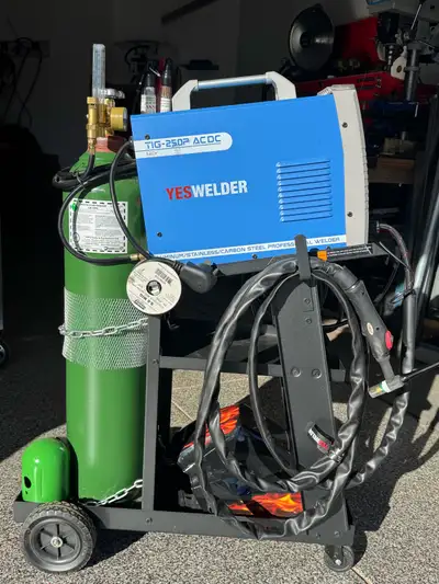 AC - DC, TIG / Stick welder, complete with all accessories - 40lb Argon tank, TIG filler rods for st...