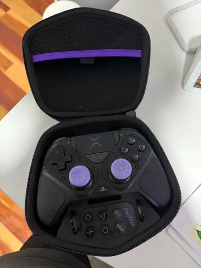 Works on PS5, PS4 and PC. Has adjustable triggers, programable paddles on back and can switch the th...