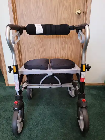 Brand new, unused walker. Size is 'mini' for shorter individuals. Features: - Cable-free brakes / ea...