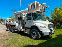 2009 Freightliner with Altec Digger/Bucket Unit (DM47)