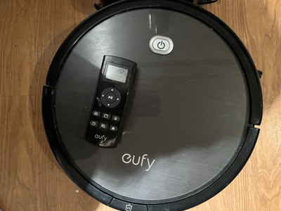 Eufy Robot vacuum with remote, instructions and spare brushes. Very lightly used!
