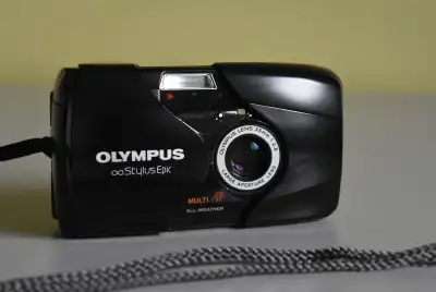 Selling an Olympus Stylus Epic Mju-II 35mm Film Camera. Comes with pouch and strap. Camera is in min...