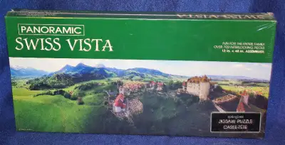 New unopened in original heat shrink jigsaw puzzle : Swiss Vista Box says over 700 interlocking piec...