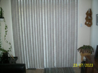 Patio door blind. Beige. 84 inches wide, 78 inches tall.