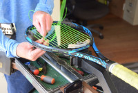 Tennis racquet stringing