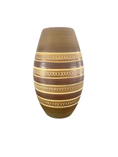 This is a MCM Dumler, and Breiden West German pottery vase. She is brown, cream, and beige with a ge...