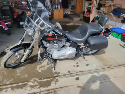 Harley Davidson Softail This bike is ready for the open Highway, equipped with a windshield, engine...