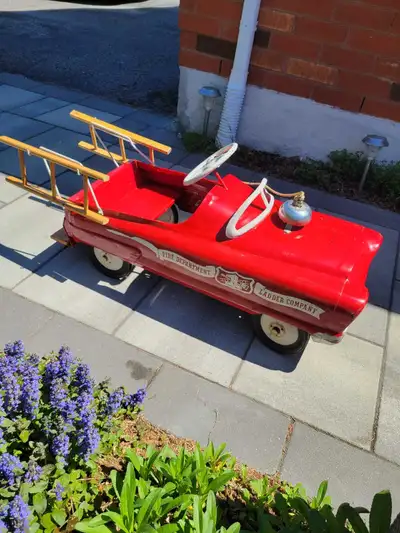 Vintage Garton Mark V pedal fire truck, specifically designed as a ladder company unit. This unit co...
