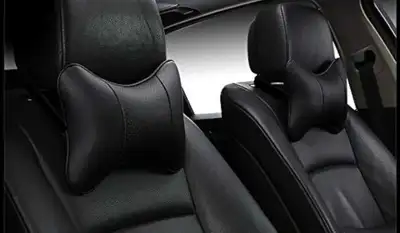 Enhance your driving experience with this ergonomic black car headrest pillow, designed for ultimate...